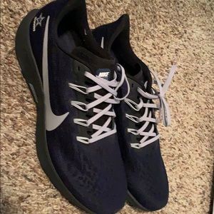 Dallas Cowboys themed Nike athletic shoes